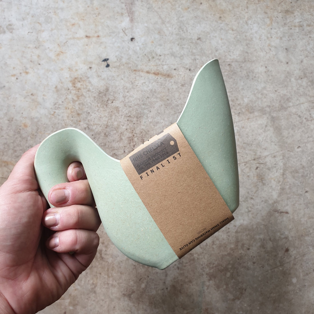 Small mint green swan watering can by Husk